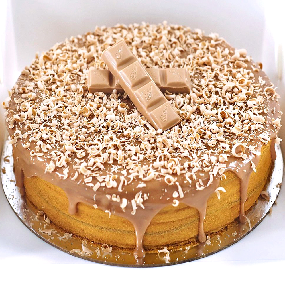 sweet honey cake with a caramel decor Stock Photo | Adobe Stock